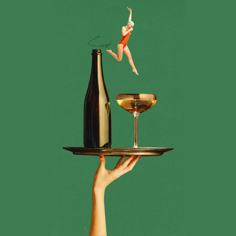 Bottle of Sparkling wine and glass held on a trey